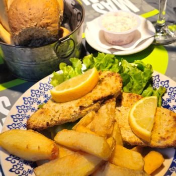 milanesa con papas en bodegon don tomas